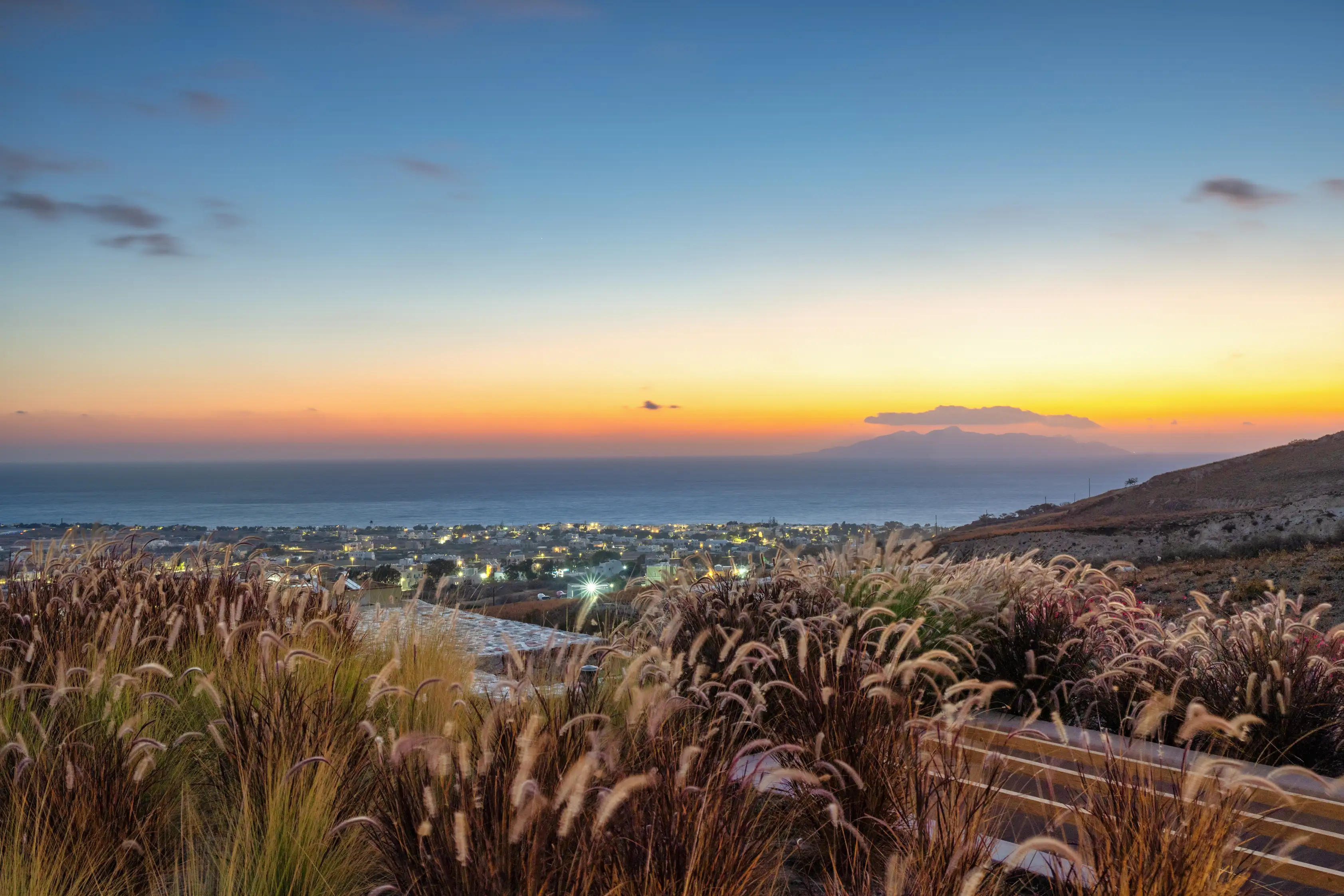 Panoramic sea views from Felicity Cave Villas in Santorini with stunning sunset