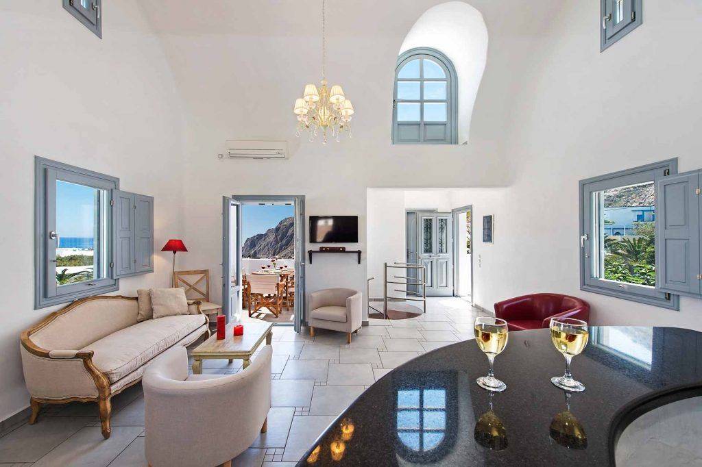 Modern interior of Felicity Villas Santorini with open plan living area and balcony